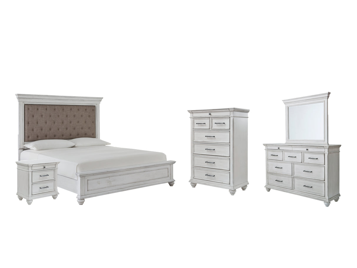 Kanwyn 7-Piece Queen Panel Bed with Mirrored Dresser, Chest and Nightstand (Queen Panel Footboard, Queen Panel Rails, Queen Upholstered Panel Headboard, Dresser, Bedroom Mirror, Chest of Drawers, Nightstand)