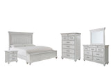 Kanwyn 7-Piece Queen Panel Bed with Storage with Mirrored Dresser, Chest and Nightstand (Queen Storage Footboard, Queen Panel Headboard, Queen Panel Rails, Dresser, Bedroom Mirror, Chest of Drawers, Nightstand)