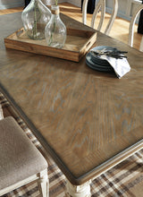 Realyn 9-Piece Dining Table and 8 Chairs (Dining Extension Table, Dining Chair, Dining Chair, Dining Chair, Dining Chair, Dining Chair, Dining Chair, Dining Chair, Dining Chair)